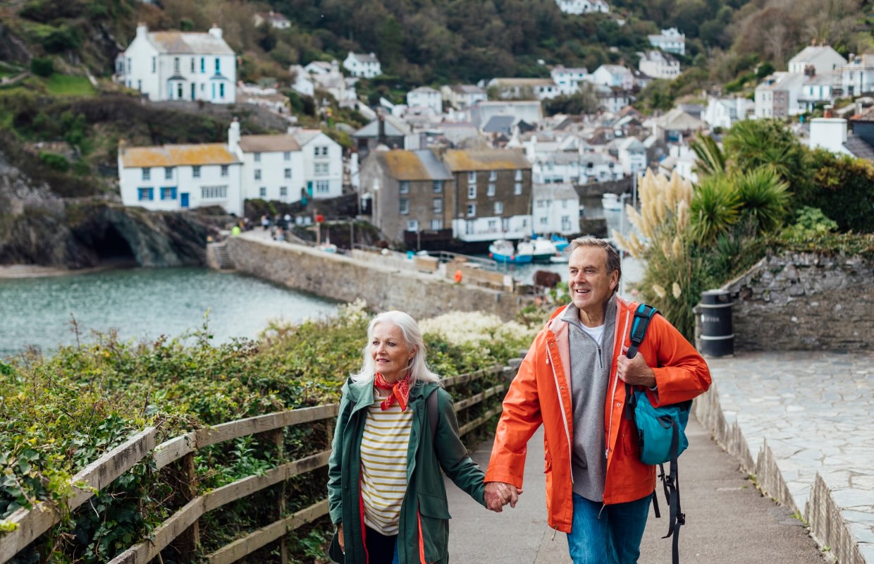 Older couple walking in Europe